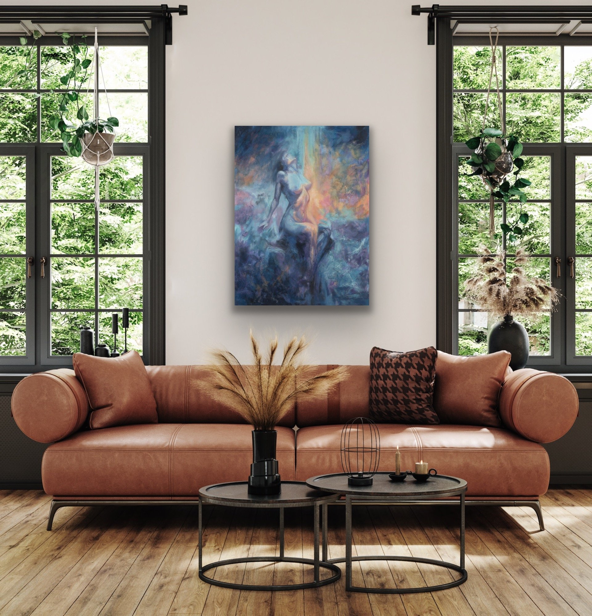 Moon's Breath blue and gold abstract painting displayed above a leather s