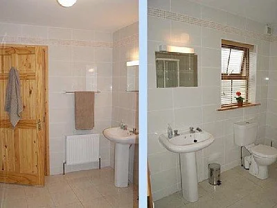 "Jack and Jill"  ensuite connecting back King bedroom and twin bedded room. Also with an electric shower.