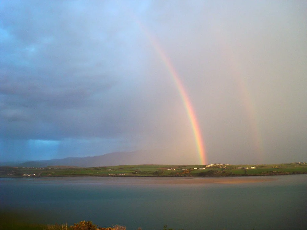 Rainbows viewed across Barrow Harbour.