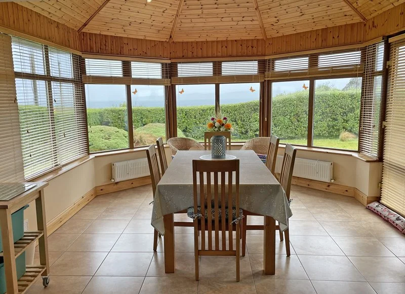 Large dining area with beautiful views towards Kerry Head, and spectacular sunsets