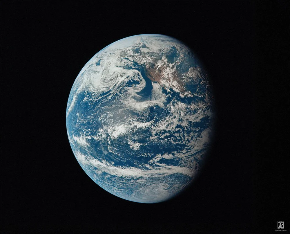 “Looking Back” | Source: NASA