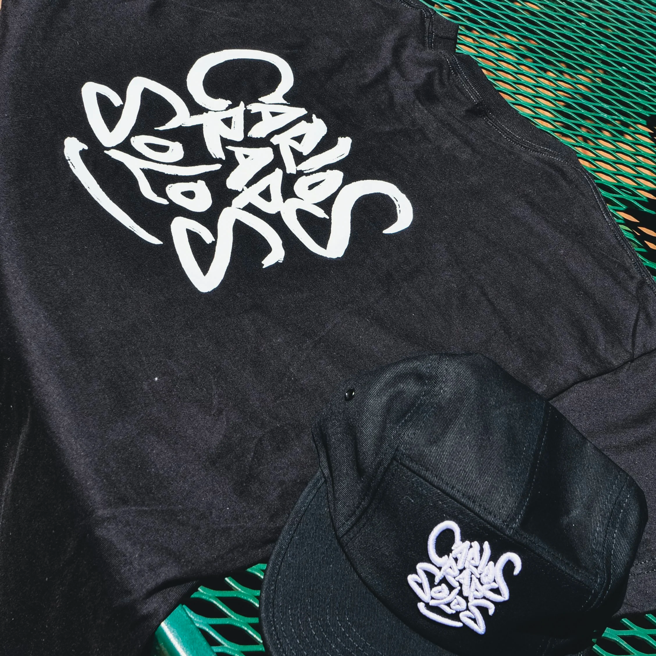 In+Frame-CR+T+Shirt+and+Hat+3.png