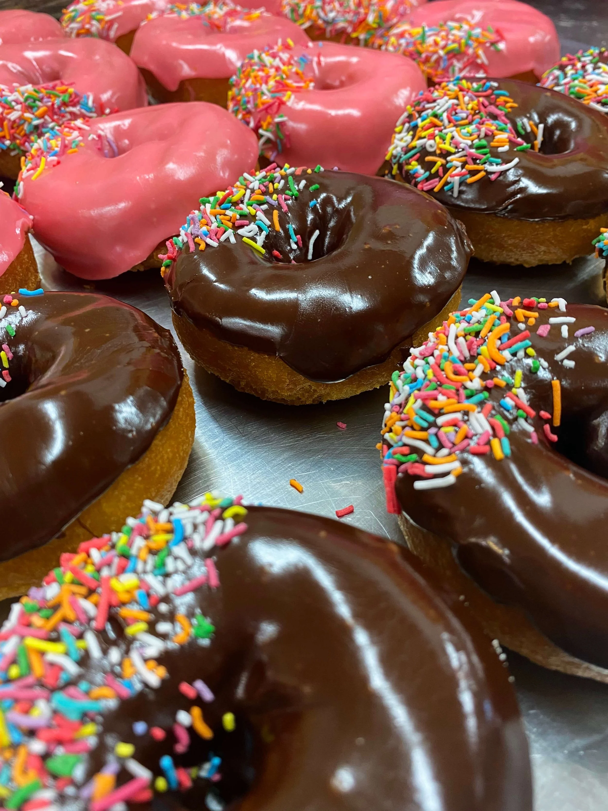iced chocolate and strawberry donuts