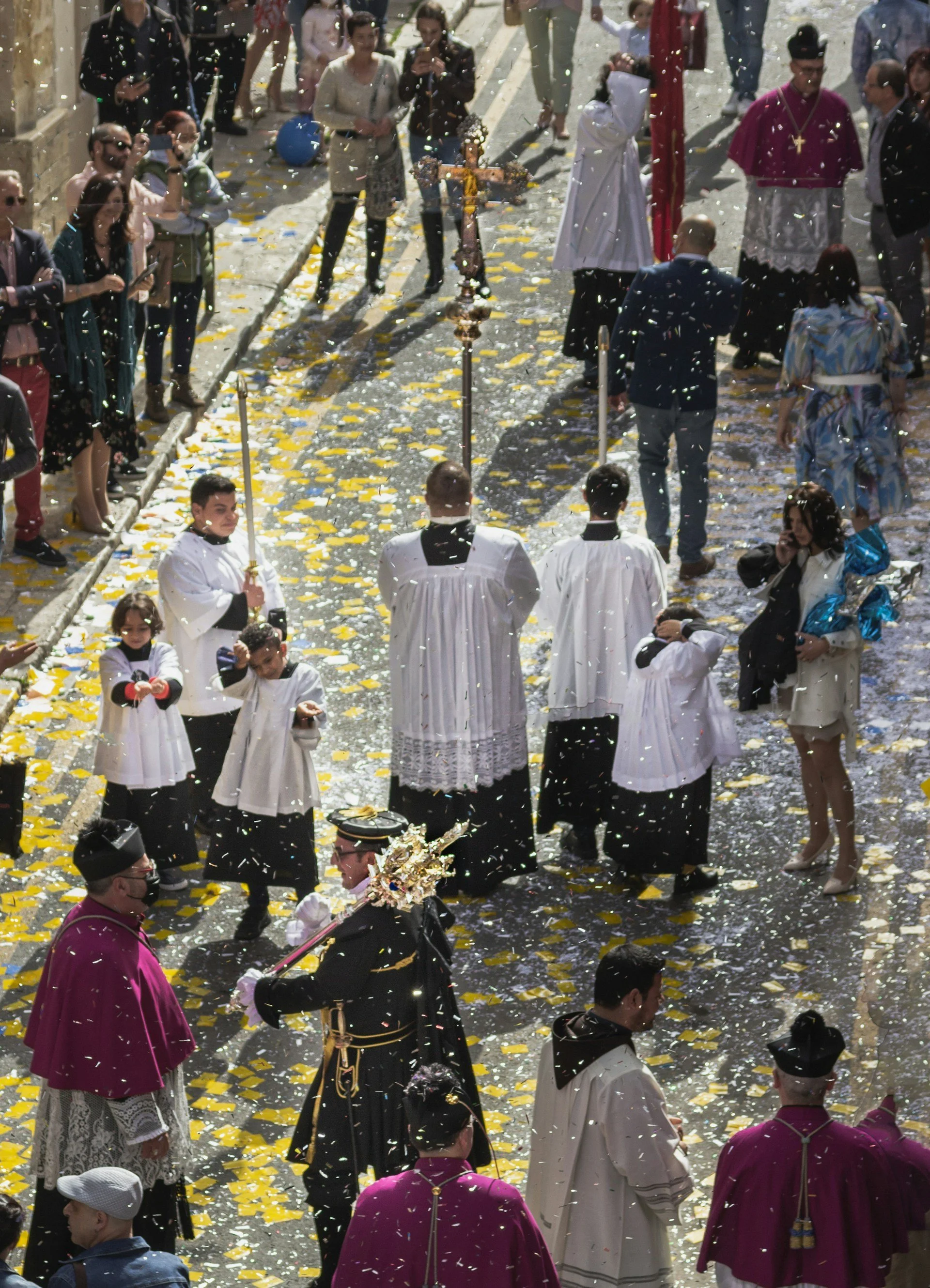Elevated view of Easter procession in Malta showing organised movement, spatial hierarchy and rhythm within the urban street setting