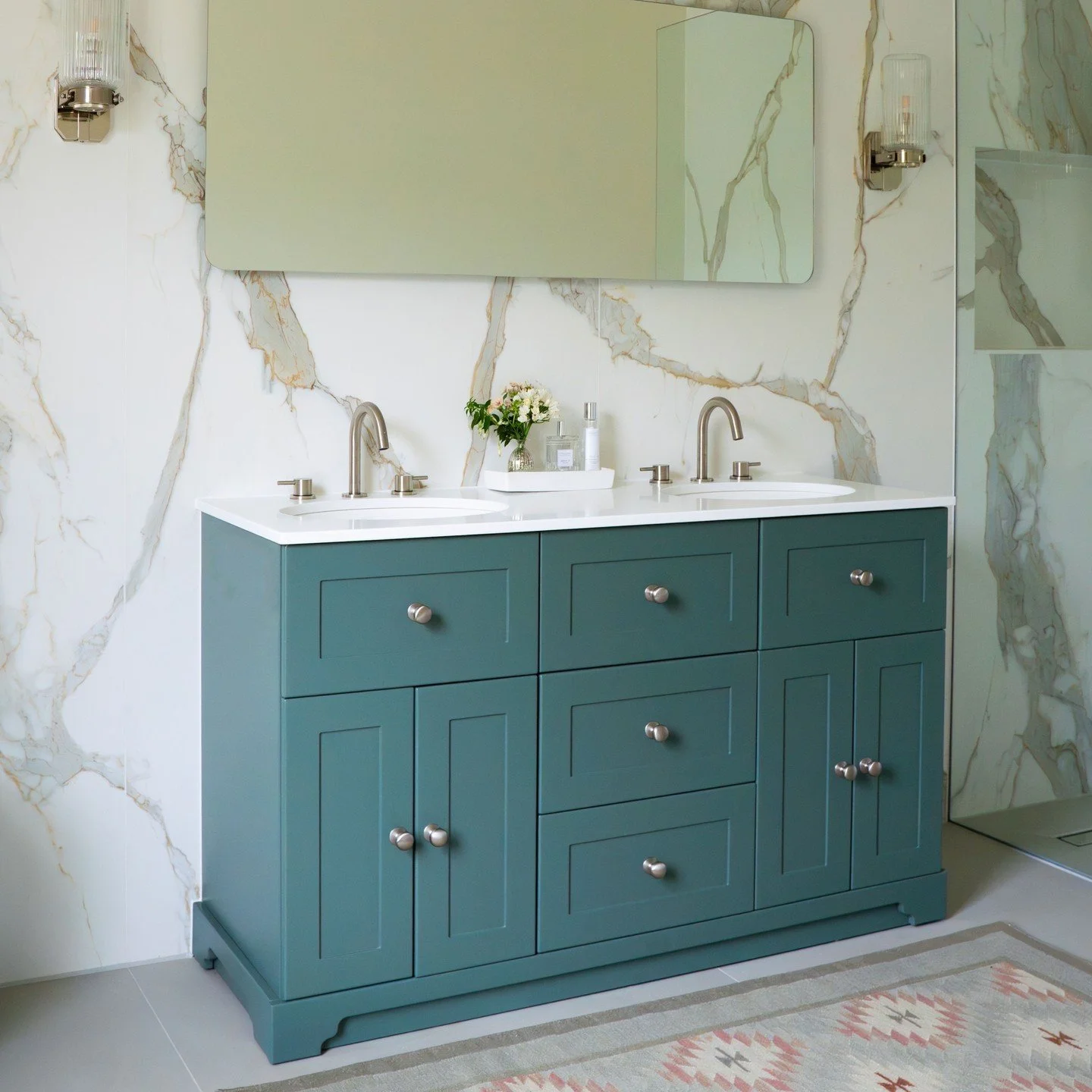 Not every room in a period property needs to feel traditional.  This Georgian home had remained largely untouched since the 1970s, so when it came to the bathrooms, we took a different approach.  Contemporary, practical and easy to maintain, these sp