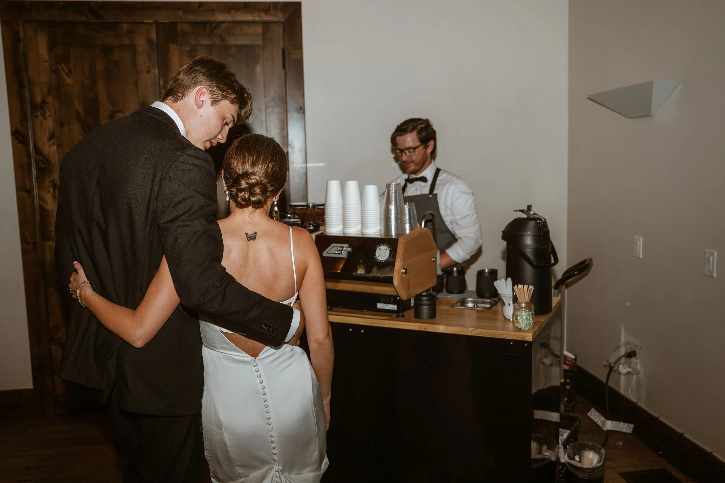 Coffee Cart Catering Denver with Bride & Groom Ordering Drinks at a mobile espresso bar