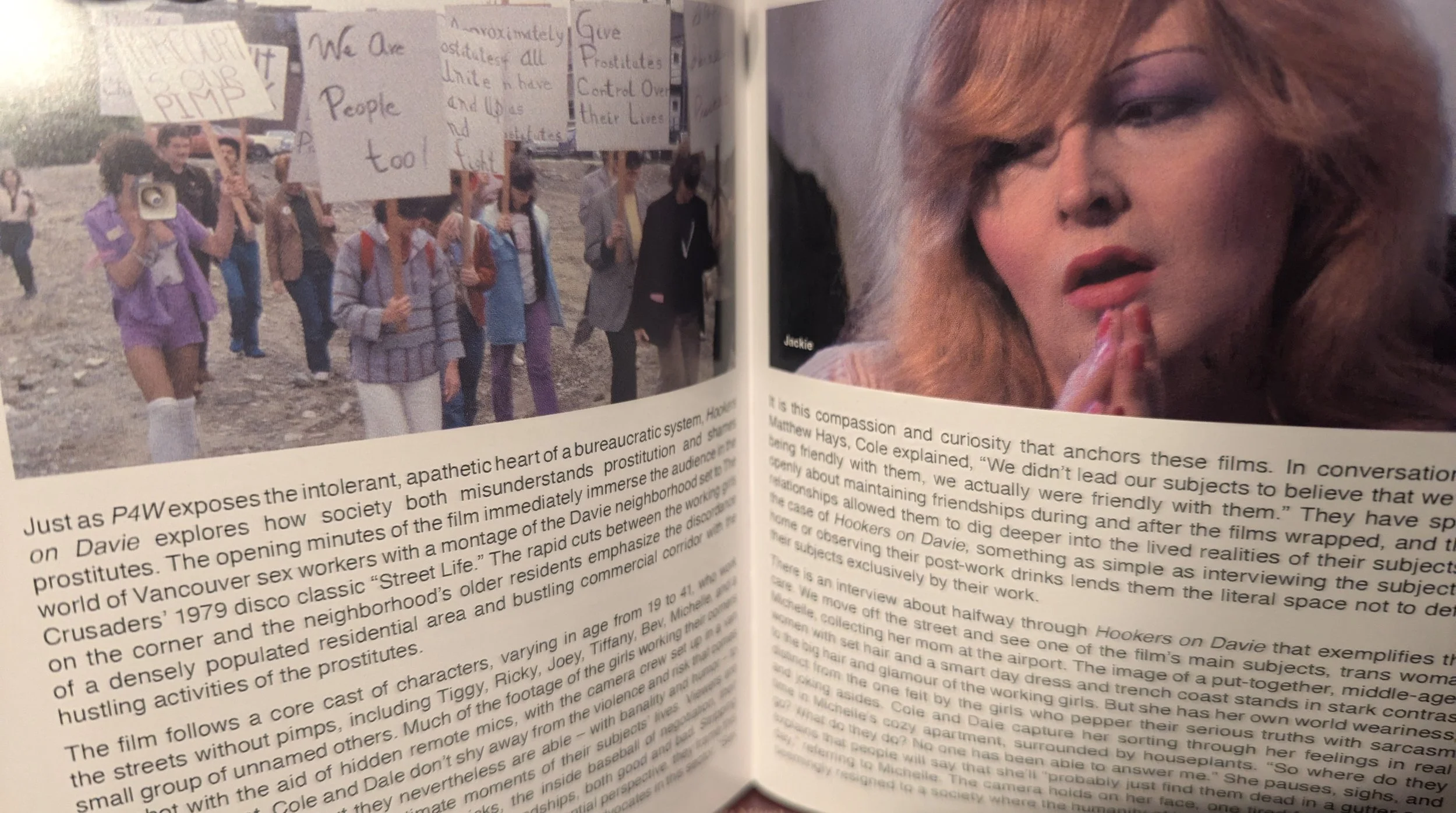 Close-up of two pages opened vertically. Images on tops of both pages, while the bottom halfs each have two paragraphs of text. The left image shows a group of people protesting, while the right image features a woman (Jackie) in close-up.