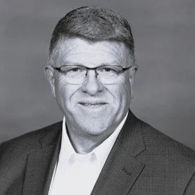 Black and white portrait of Randy McKinney, Emperion's Senior Vice President of IME Operations. 