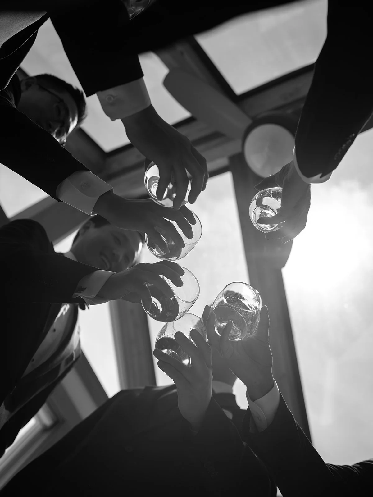 men celebrating at a wedding