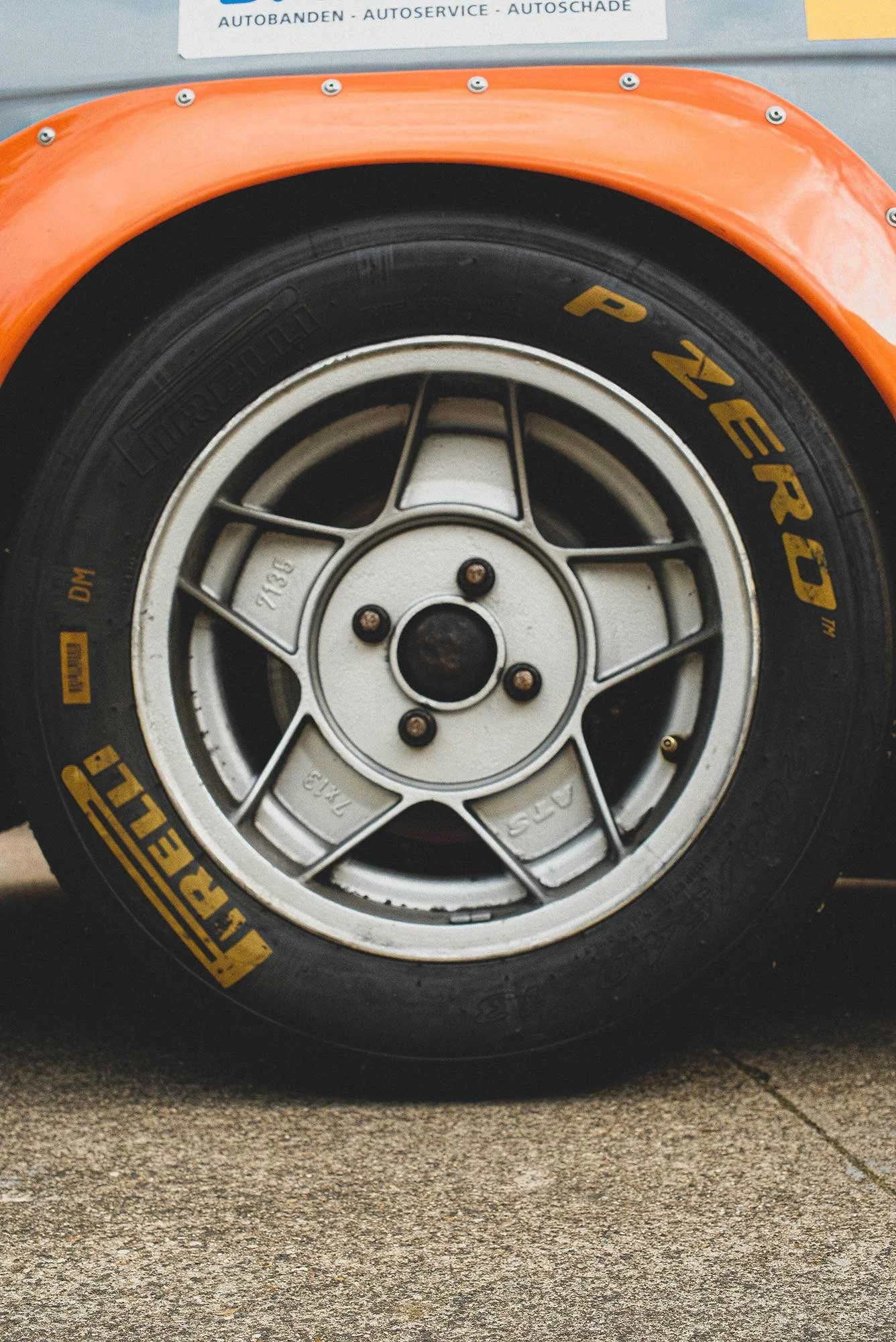 Engine detail photo of a vintage 1966 blue NSU Prinz 1000 TT car in a workshop location. Bespoke build by premium car restoration and modification workshop Retro Sporting in California.