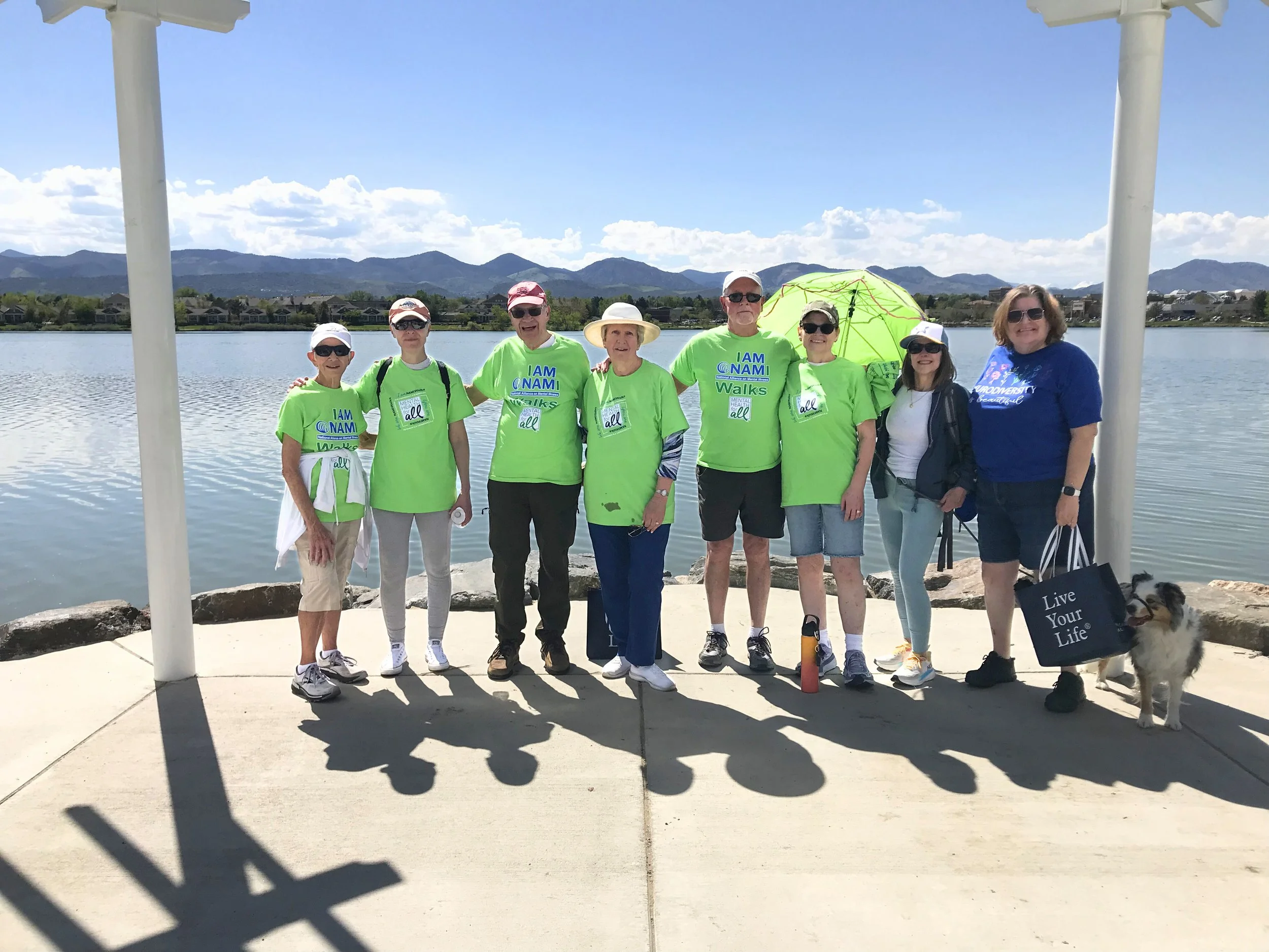 The Mental Health team & supporters walked in a benefit for local nonprofit NAMI, posing with beautiful mountain vista behind them