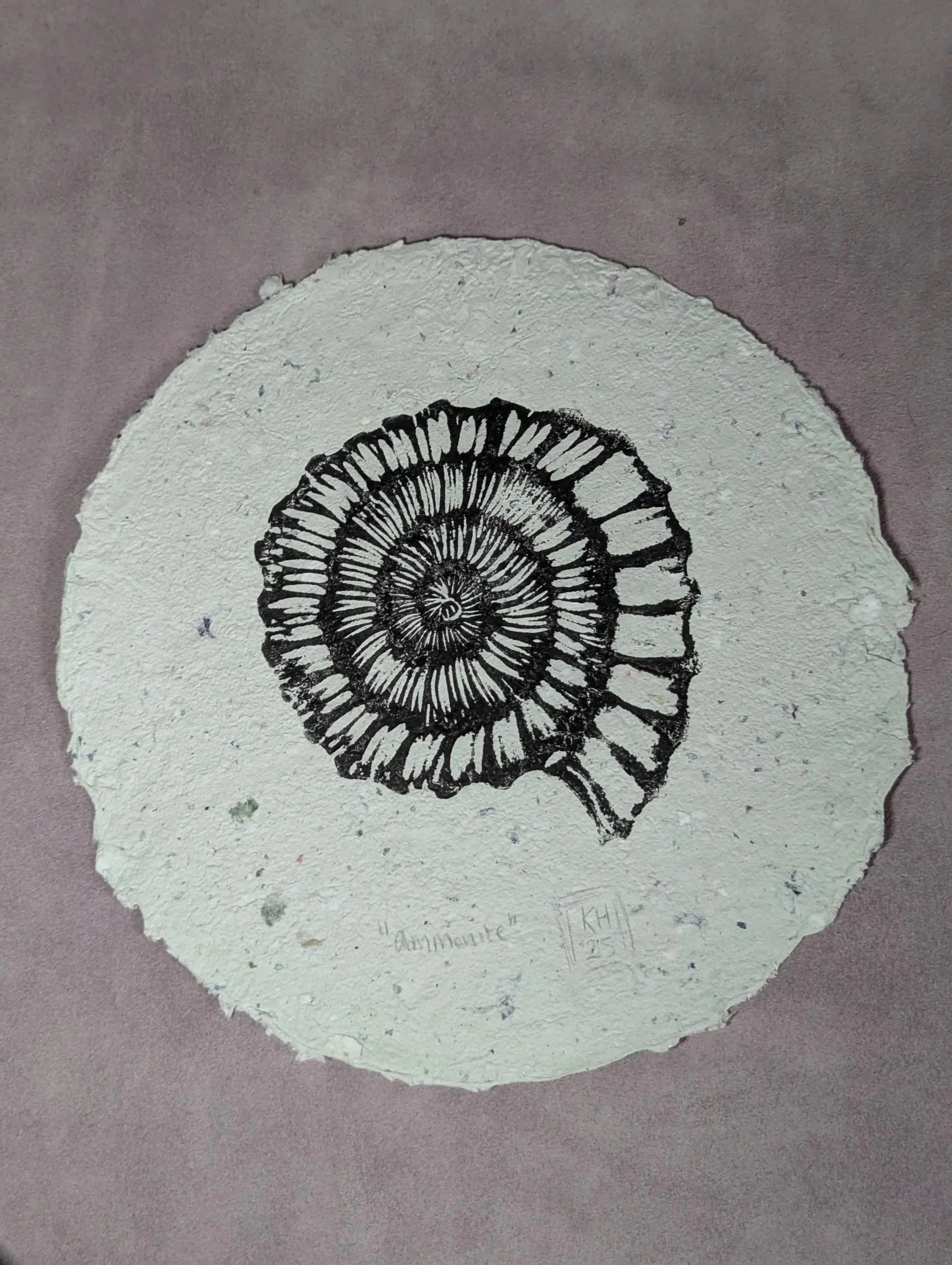 Ammonite - original linoprint on round handmade recycled paper