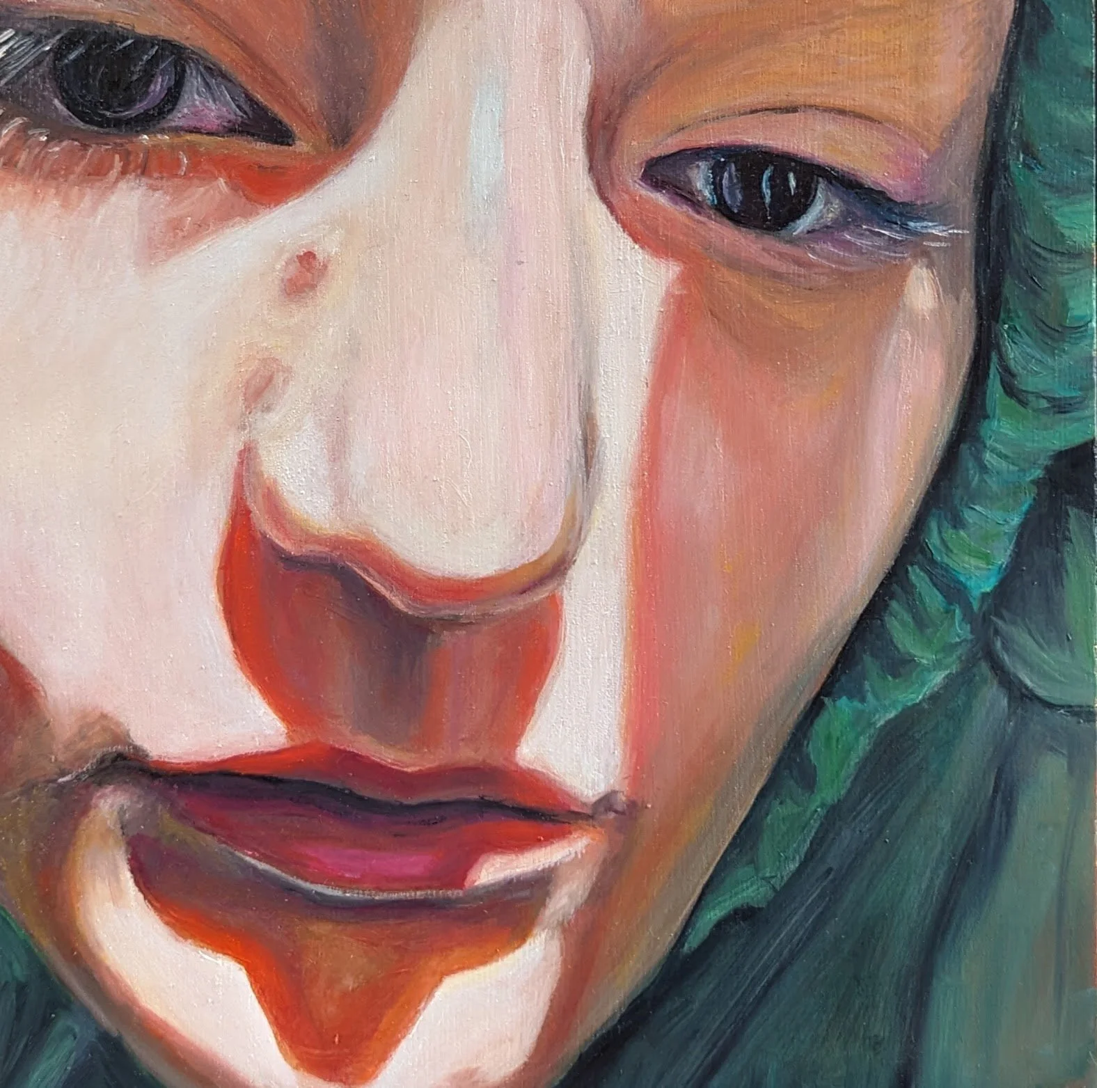 Portrait of a woman in a green hoodie