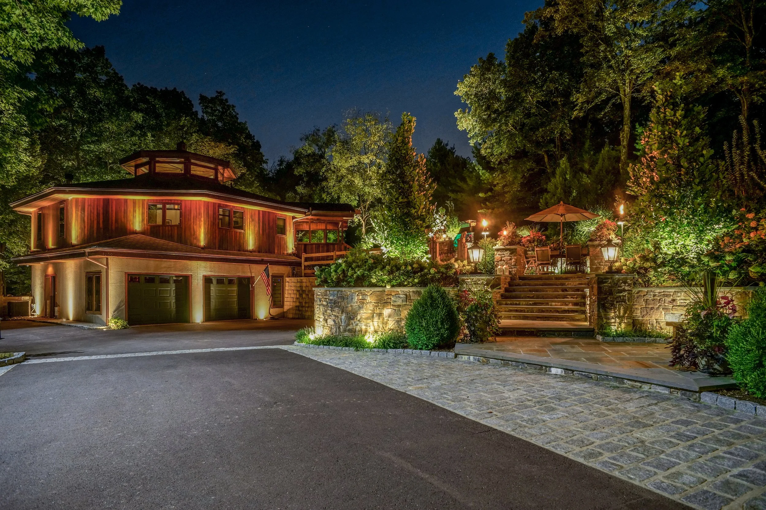 Coastal Source Lighting Entrance - Washlights + LED Tiki Torches + MR16 Bullet Uplights.jpg