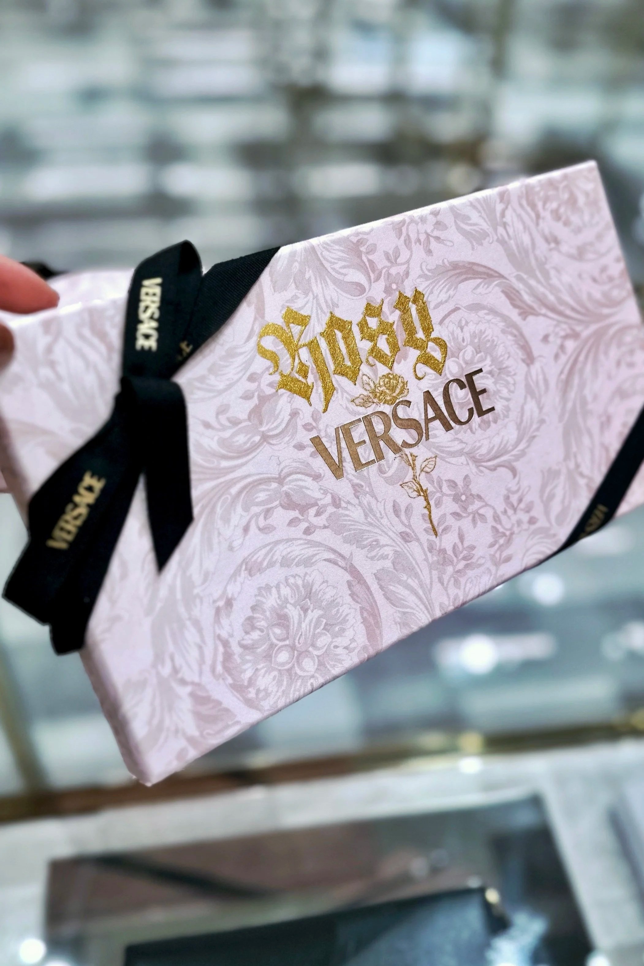 Versace | Personalized complimentary chocolate boxes in-store, transforming luxury gifting into a memorable client experience.