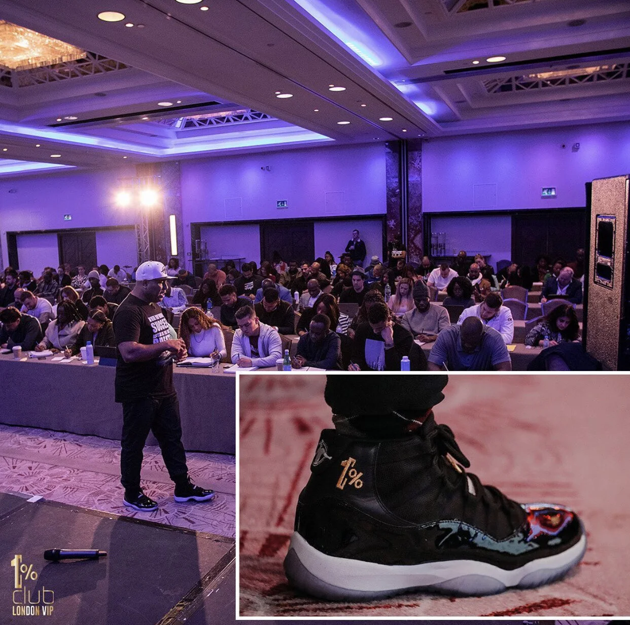A conference or seminar with many attendees sitting at tables in a large, dimly lit room with purple lighting. A man in a black t-shirt, white cap, and sneakers is standing at the front. In the lower right, there is a close-up of a black sneaker with