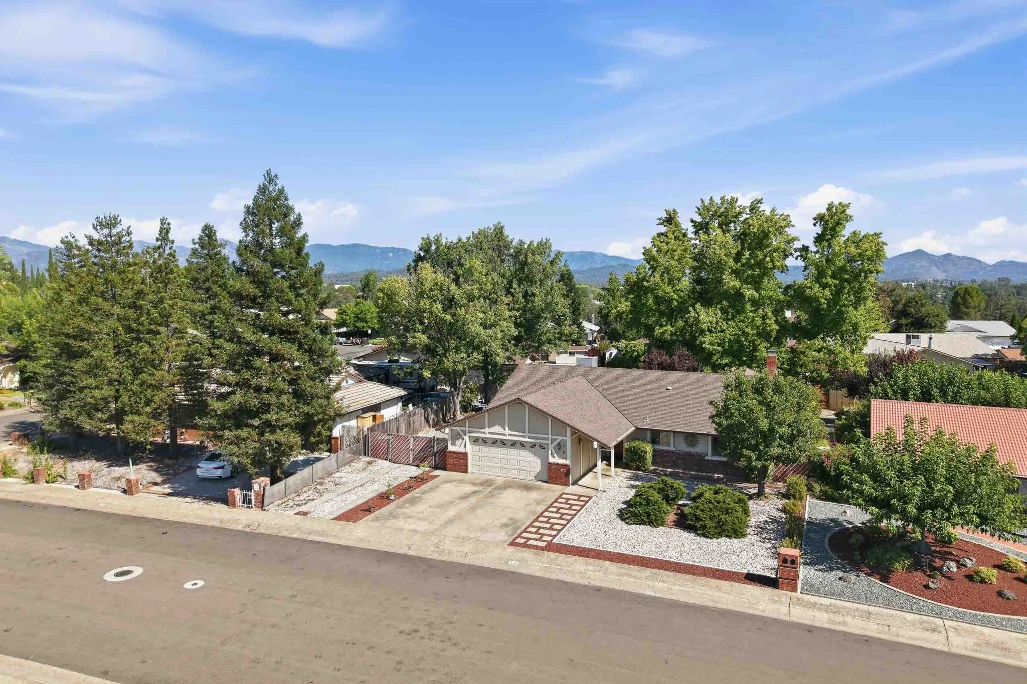 Aerial view of a single-story Redding home with low-maintenance landscaping.