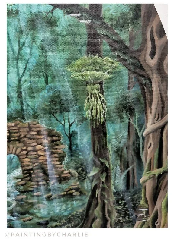 Close up - A giant staghorn fern dominates the midstory layer, overlooking the scene below.