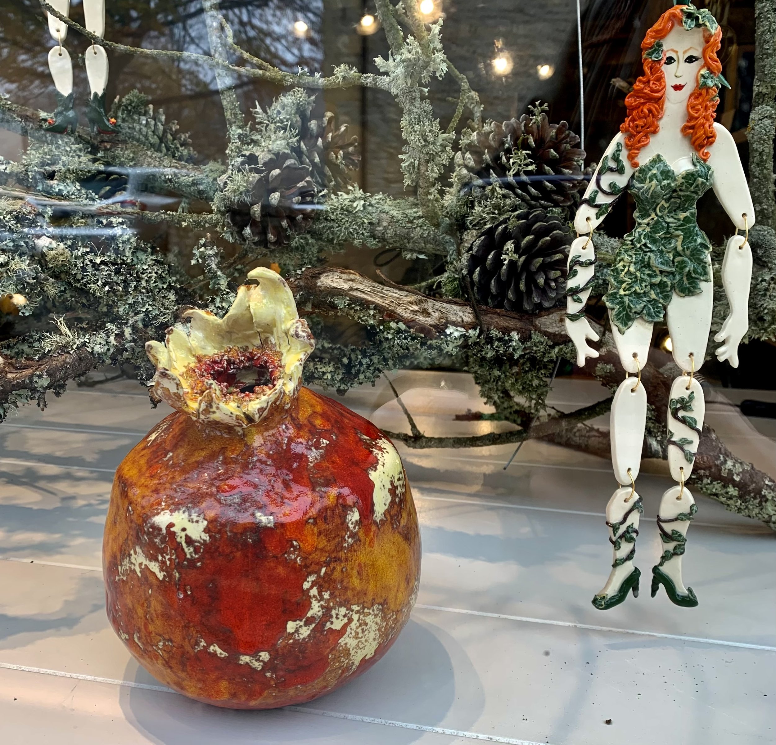 'Poison Ivy' stayed beside a volcanic glazed pomegranate.
Cornish stoneware ceramic, sculpted and decorated by hand with layers of ivy leaves and entwining tendrils. 33cm tall.