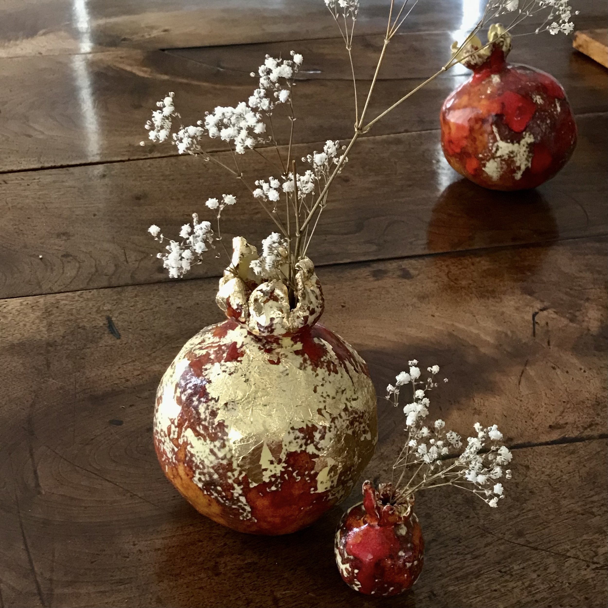 Angels Breath: three glazed pomegranates.