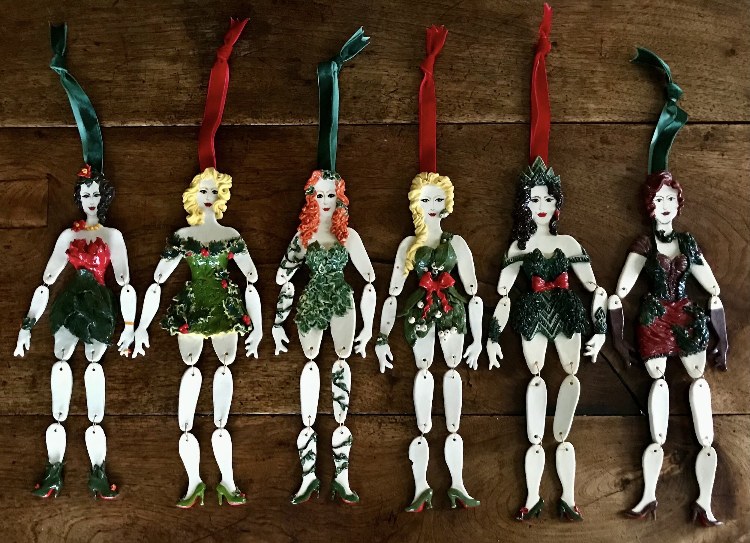 'Maidens of Midwinter'
Each marionette, sculpted from Cornish stoneware clay, is a personification of a classic variety of festive foliage. The impression of spruce sprigs and ivy leaves, foraged for while out walking in the countryside and then pres