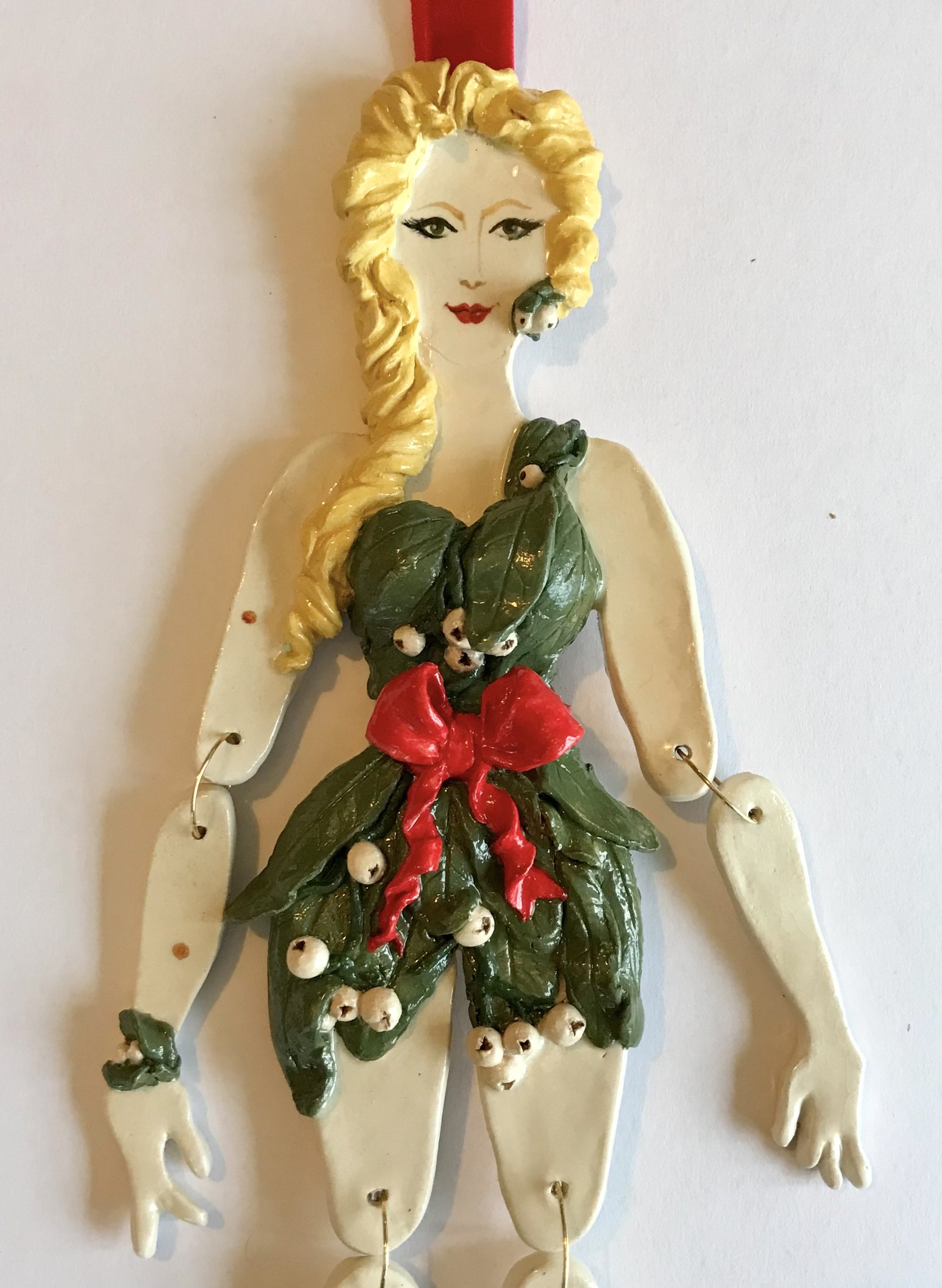 'Kiss-Me Miss Mistletoe'
Cornish stoneware ceramic, sculpted and decorated by hand with leafy bunches of berry-bearing mistletoe. 33cm tall.