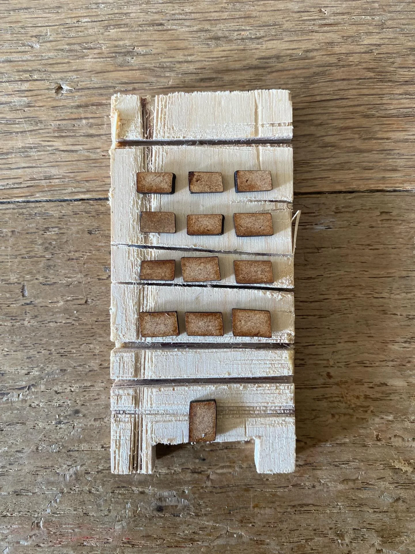 These windows and the door are the little negatives that fell out of the ladders when I laser cut my drawing&hellip;
I like how they&rsquo;re not exact rectangles - wonky as the ladders!
.
.
#thebeautyofimperfection #makestuffwithyourhands #anniebrun