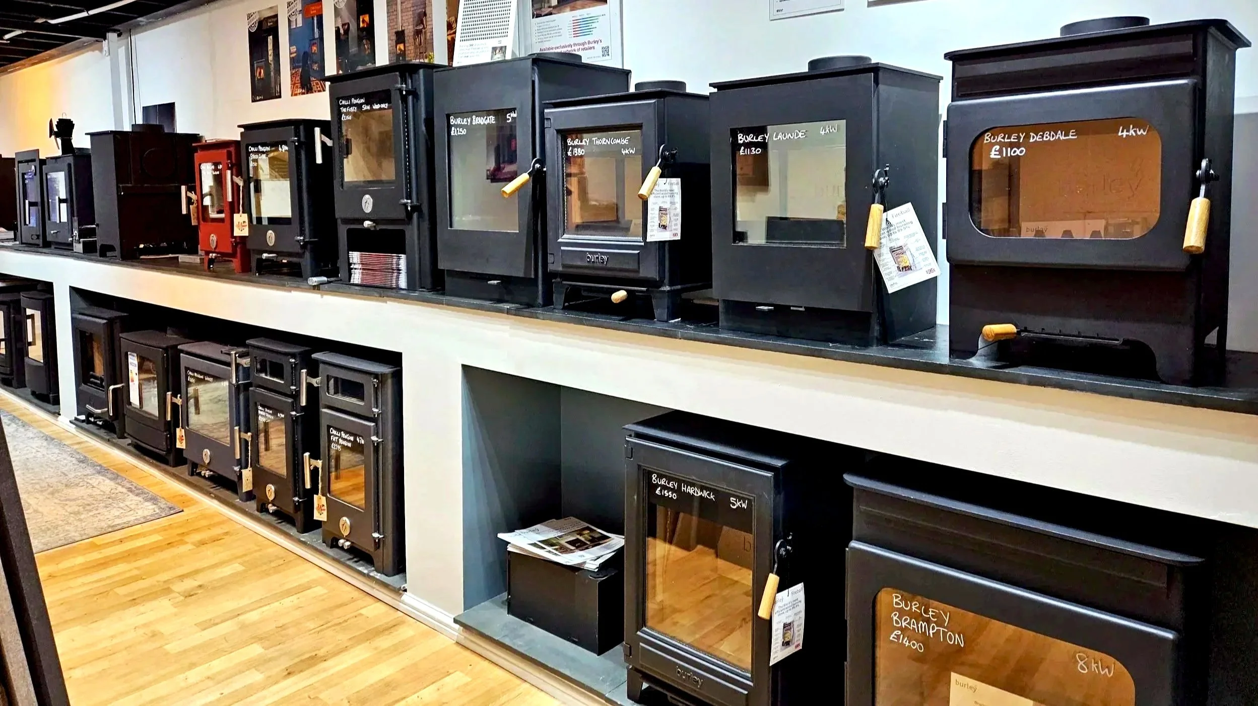 premium wood burning stove display in Fosse Fires Gloucestershire showroom