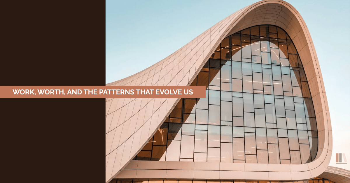 Modern architectural workplace image with the words “Work, Worth, and the Patterns That Evolve Us.”