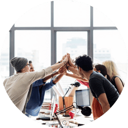 a person is looking at architectural plans on a cork board