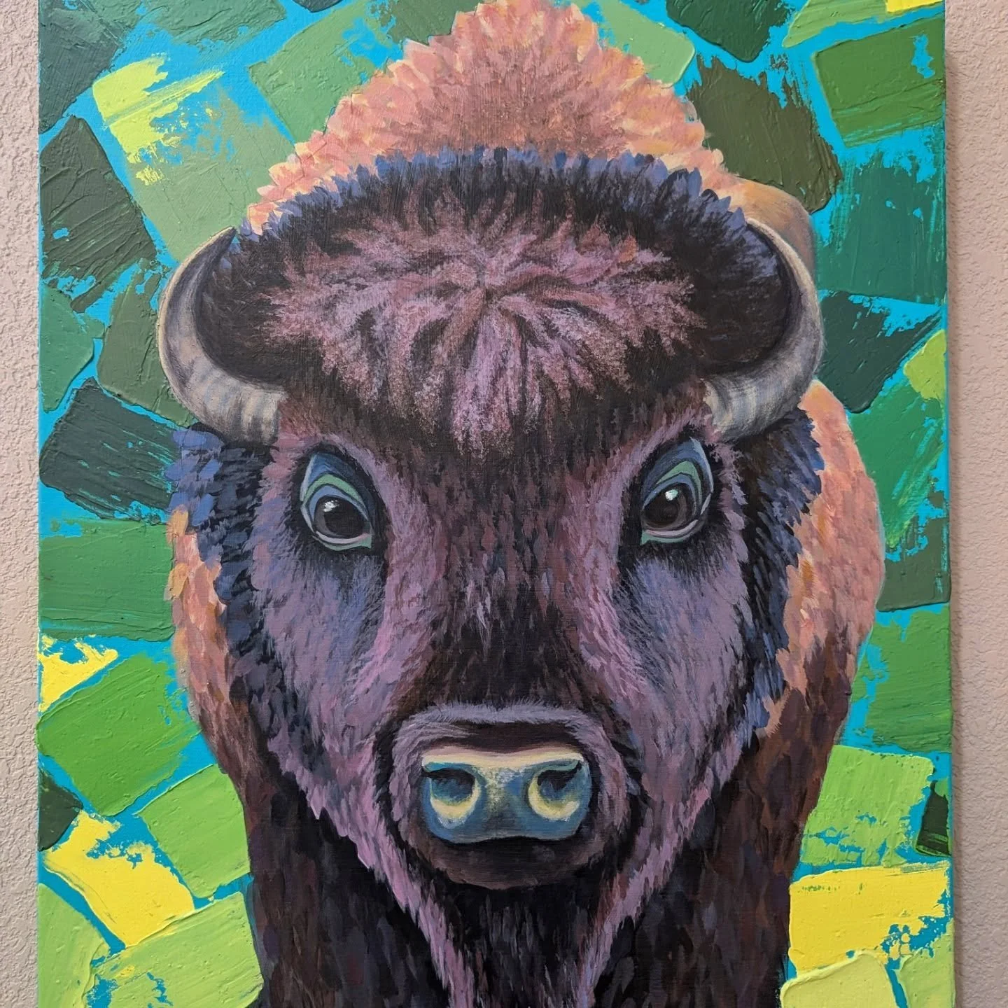 I think I'm done with a painting, but then I find myself working on it again just a few weeks later 🤭 While I loved the impressionistic texture on other bison paintings, I wasn't feeling it so much on this larger canvas. Recently I changed the textu