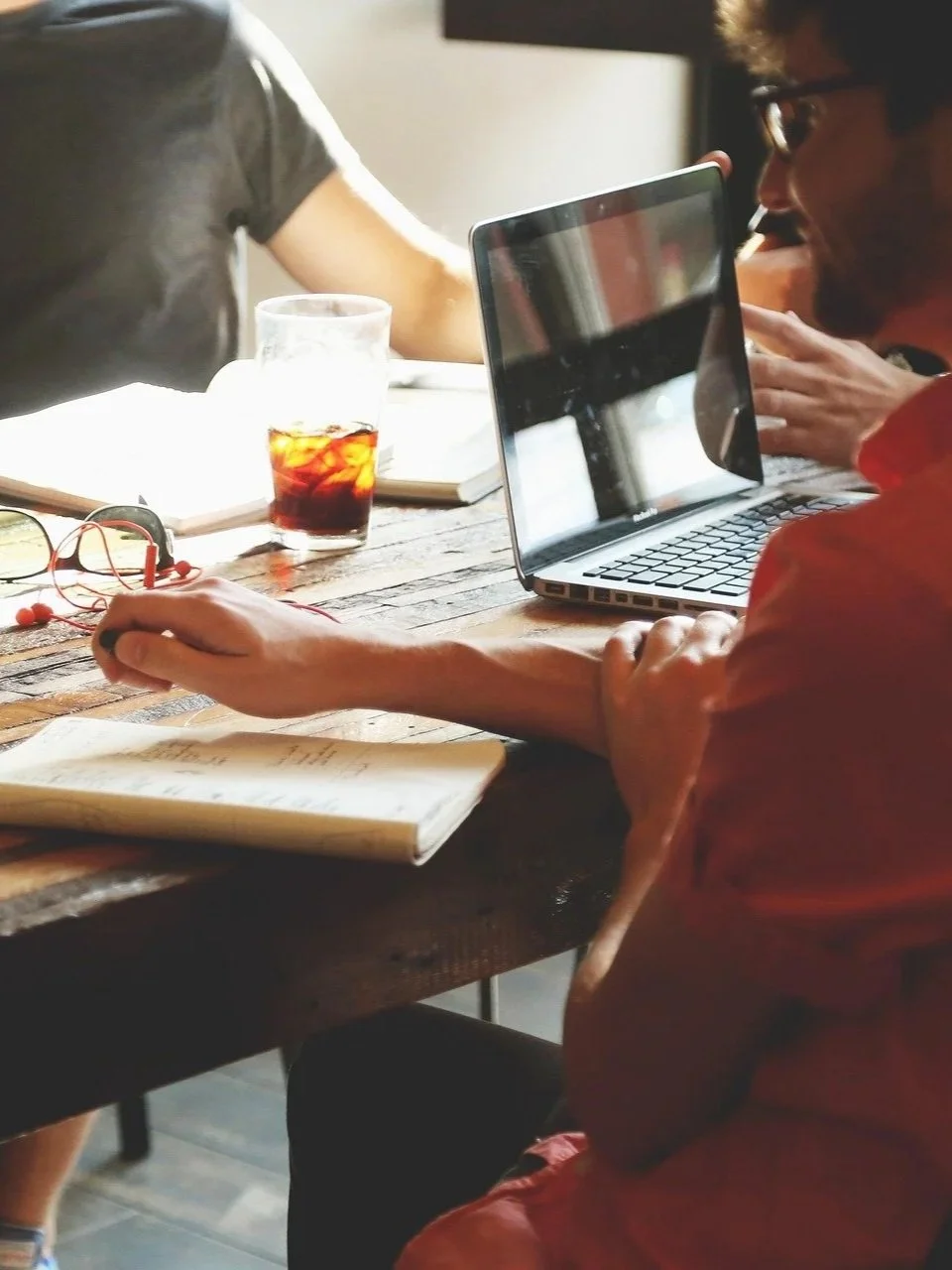 business paperwork on a desk with business staff