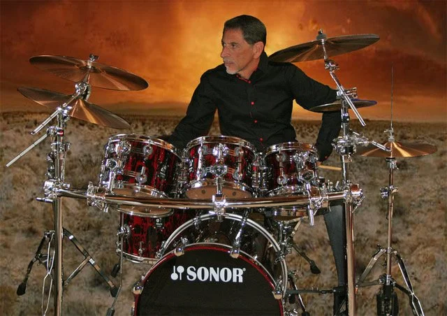 Mark with drums_PSD sunsetFB.jpeg