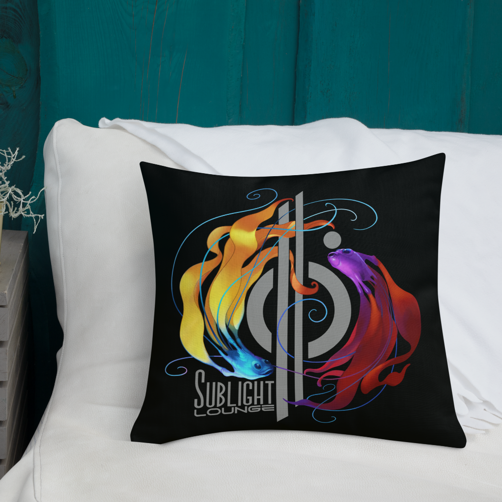 Decorative pillow with colorful hydrominae fish and abstract swirls on a bed in a bedroom.