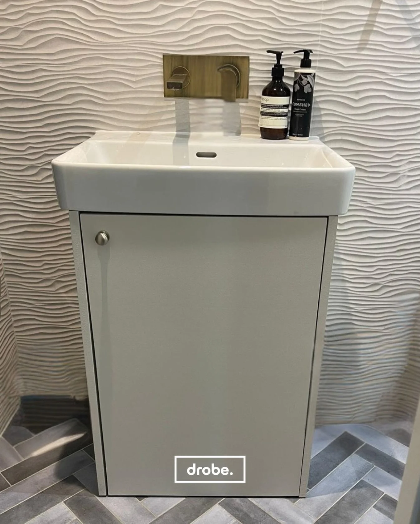 When smart storage meets good design 🫧 We installed this under-sink cabinet in our Putney project to add hidden storage and a clean, modern look. Simple changes = big impact.