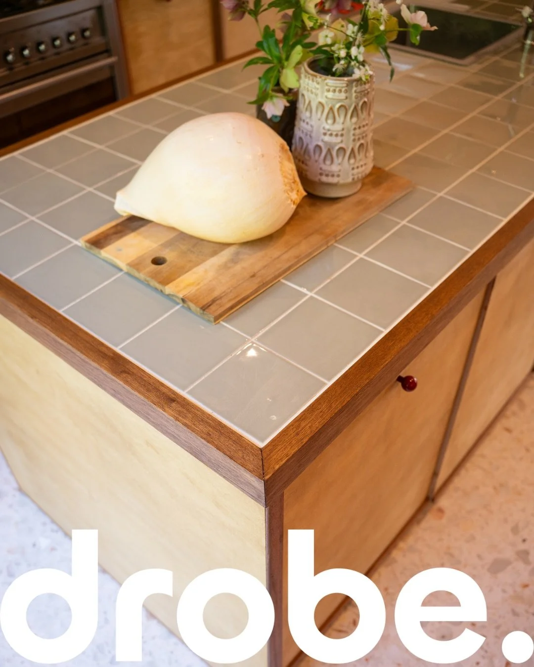 Design notes from this project&hellip;

Rather than relying on one standout feature, this kitchen is all about the way materials work together. Warm timber framing, birch plywood cabinetry, tiled worktops, a dramatic marble splashback, and deep red d