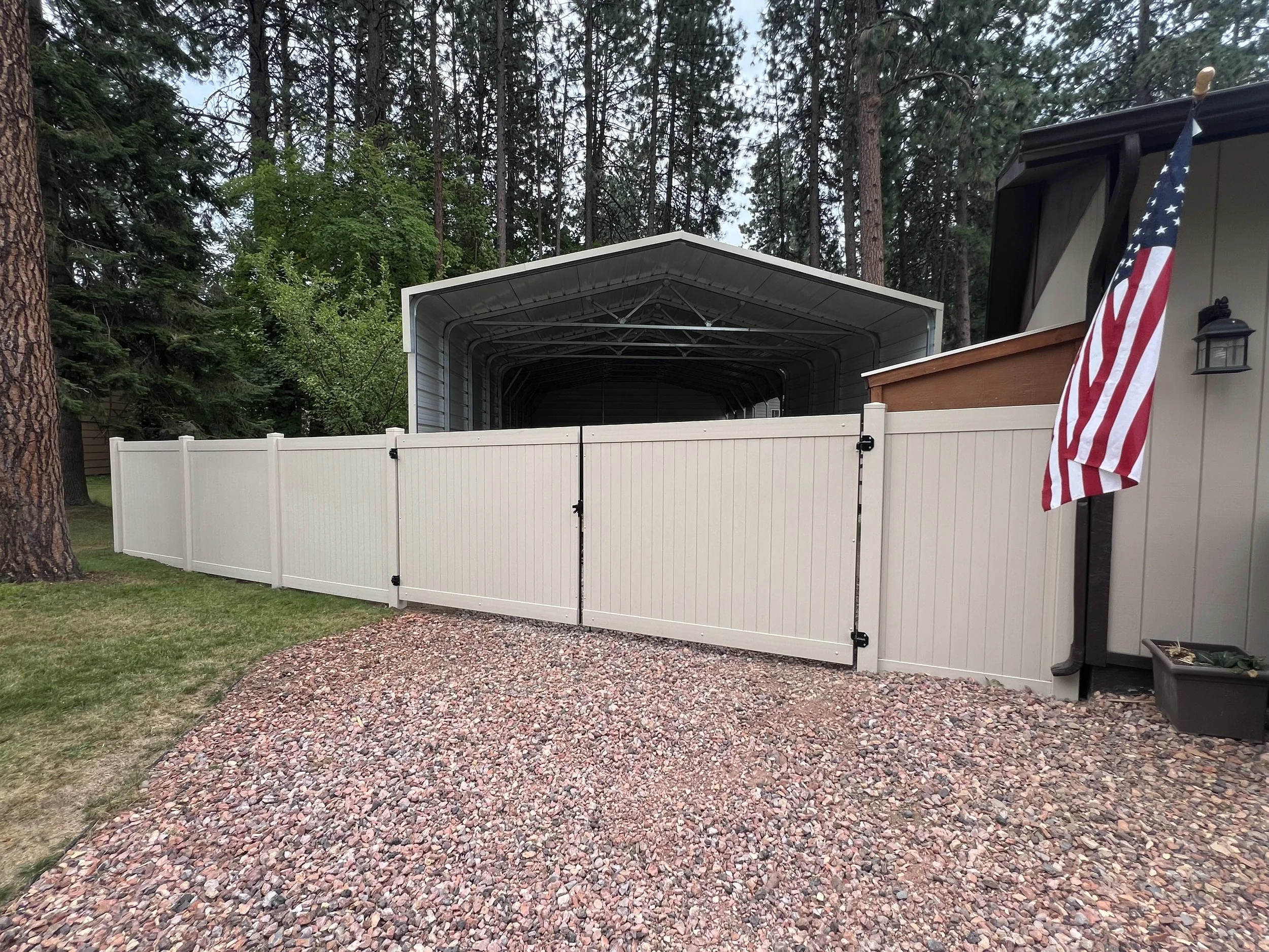 White Vinyl Privacy Fencing and Double Drive Gate