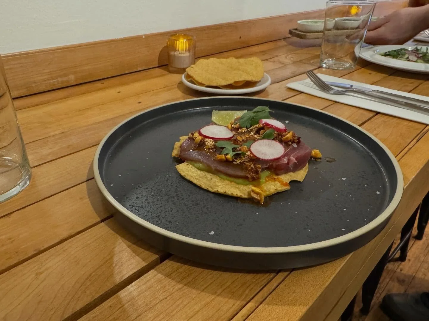 Atun Tostada! And Auguachile with Salsas in the back! So so good! Don&rsquo;t miss!