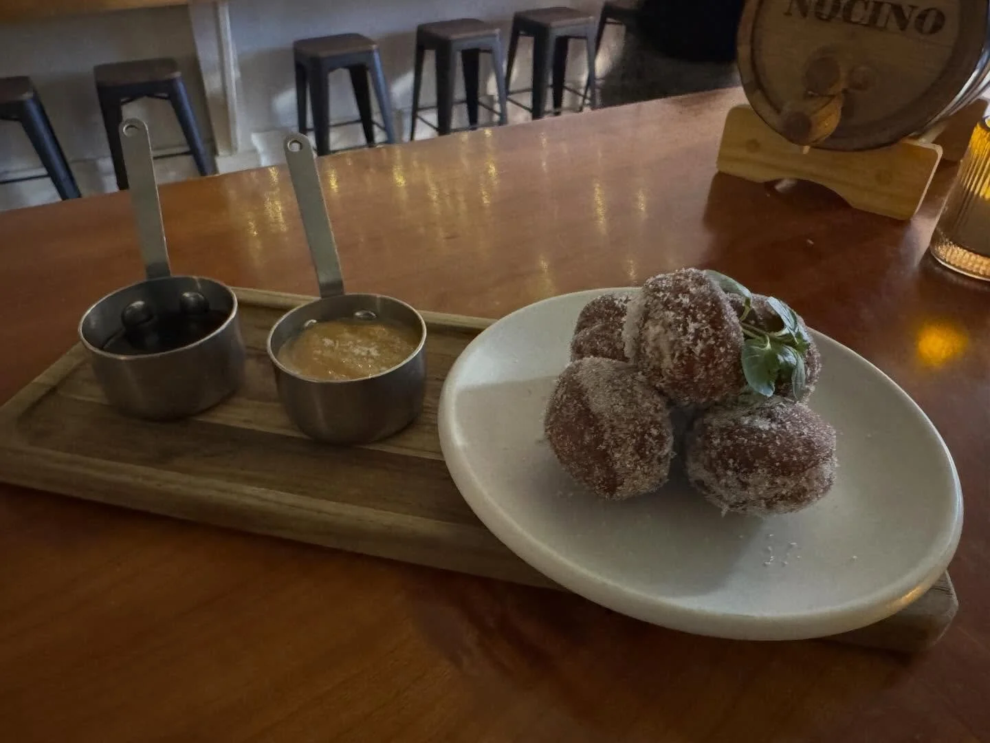 Bomboloni with a dulce de leche and chocolate sauce. Such a treat and perfect for chilly nights.