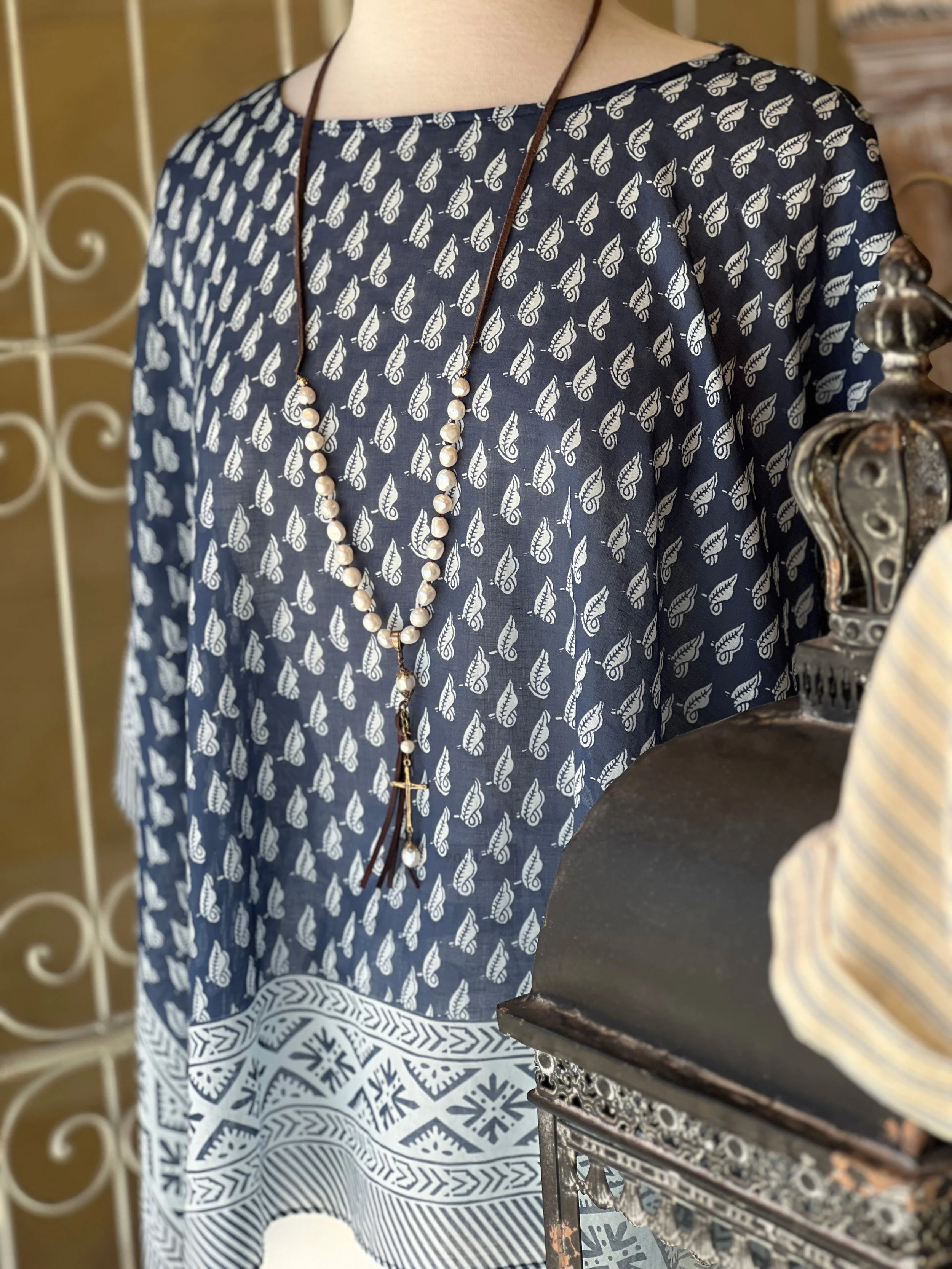 Soft layers, easy denim, coastal blues, creamy neutrals, and those little details that make an outfit feel pulled together without trying too hard.

From breezy dresses and lightweight knits to textured handbags, jewelry, gifts, and cozy pieces for c