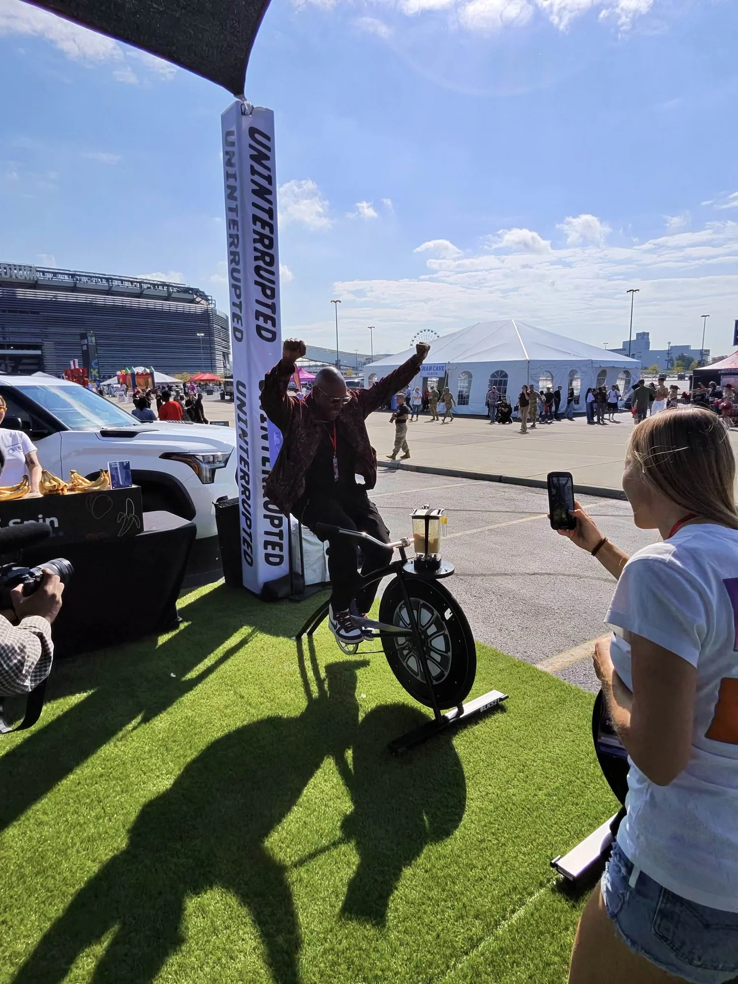 Fist-pump at a stadium activation