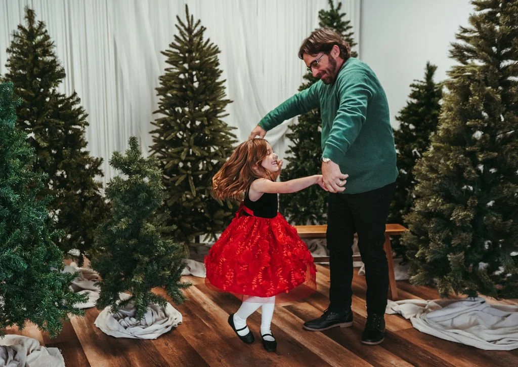 Chris dances with daughter