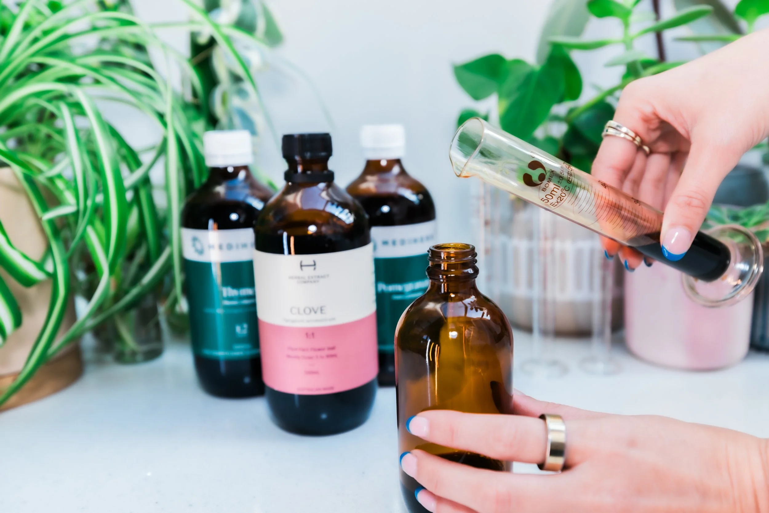 Naturopathic herbal medicine tinctures and practitioner-grade supplements prepared by Melbourne naturopath Jess Diakoumakos at Emba Wellness