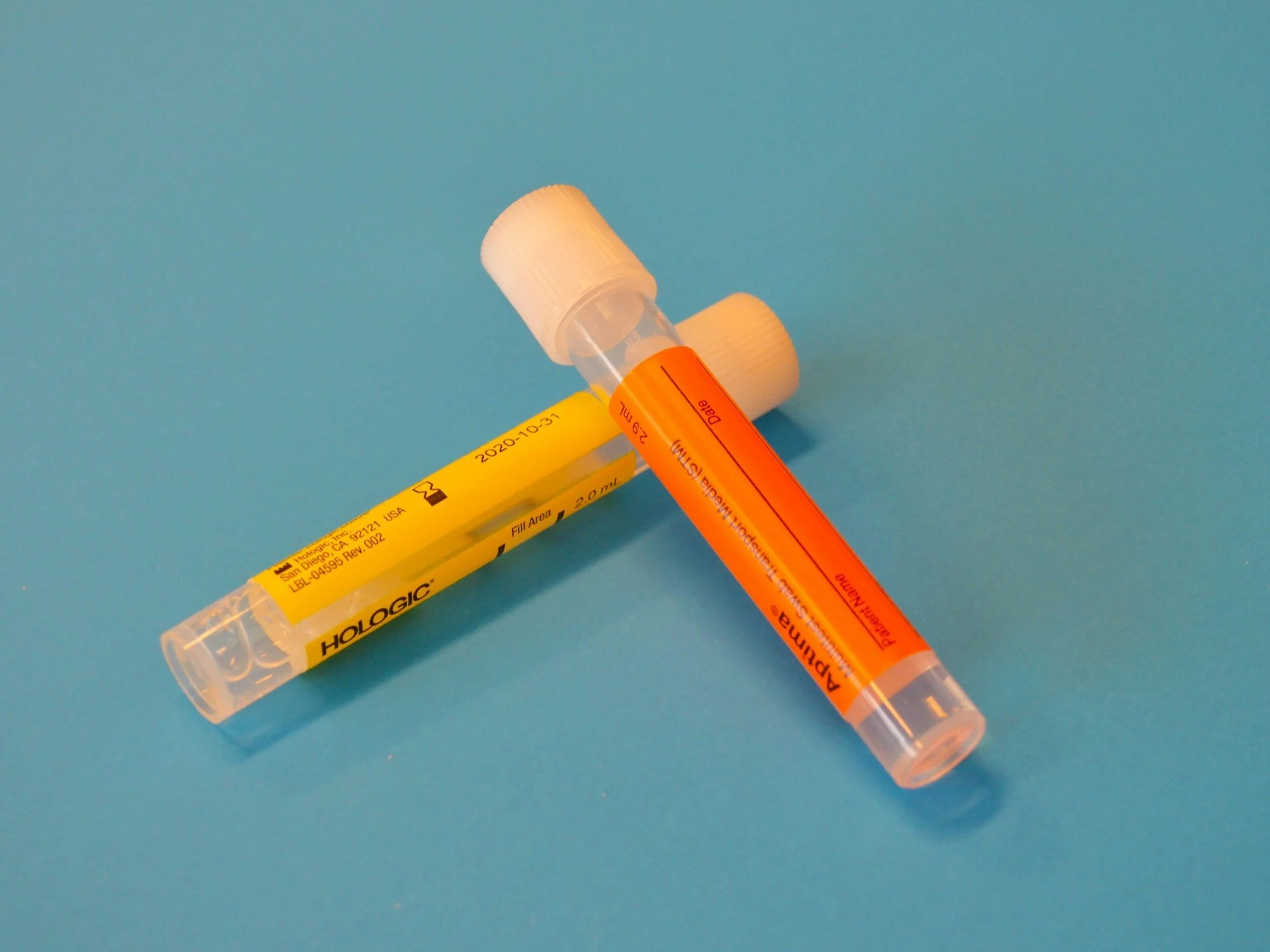 Pathology collection swab tubes representing vaginal microbiome and functional swab testing ordered by Melbourne naturopath Jessica Diakoumakos at Emba Wellness