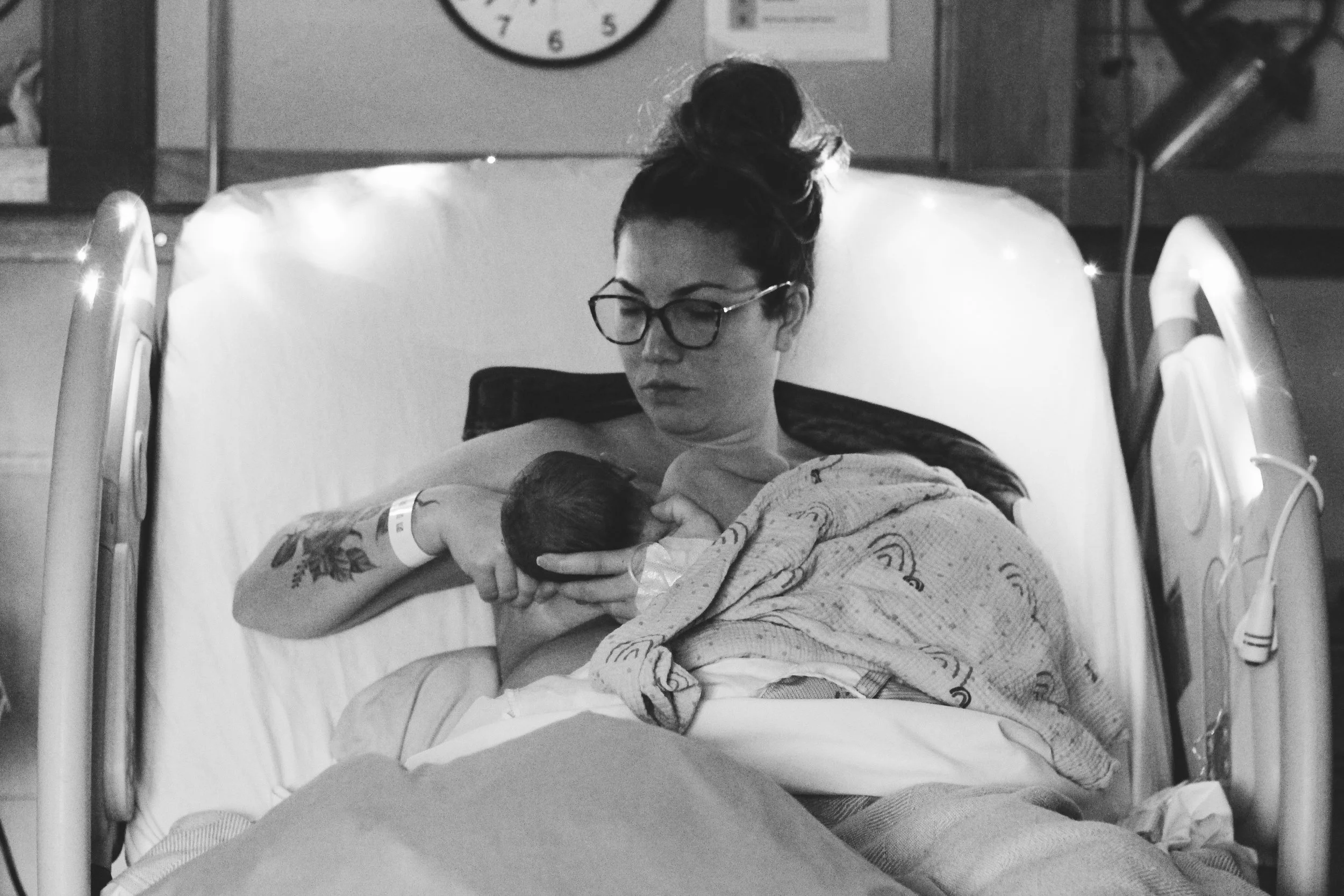 Woman just gave birth and is nursing her newborn at Sunnybrook Hospital in East York Toronto