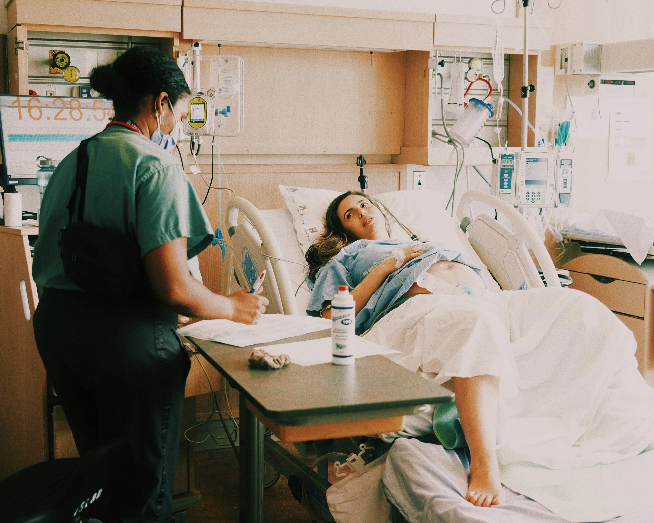 A woman giving birth at St. Michael's Hospital in Downtown Toronto L&D with Community Midwives Toronto