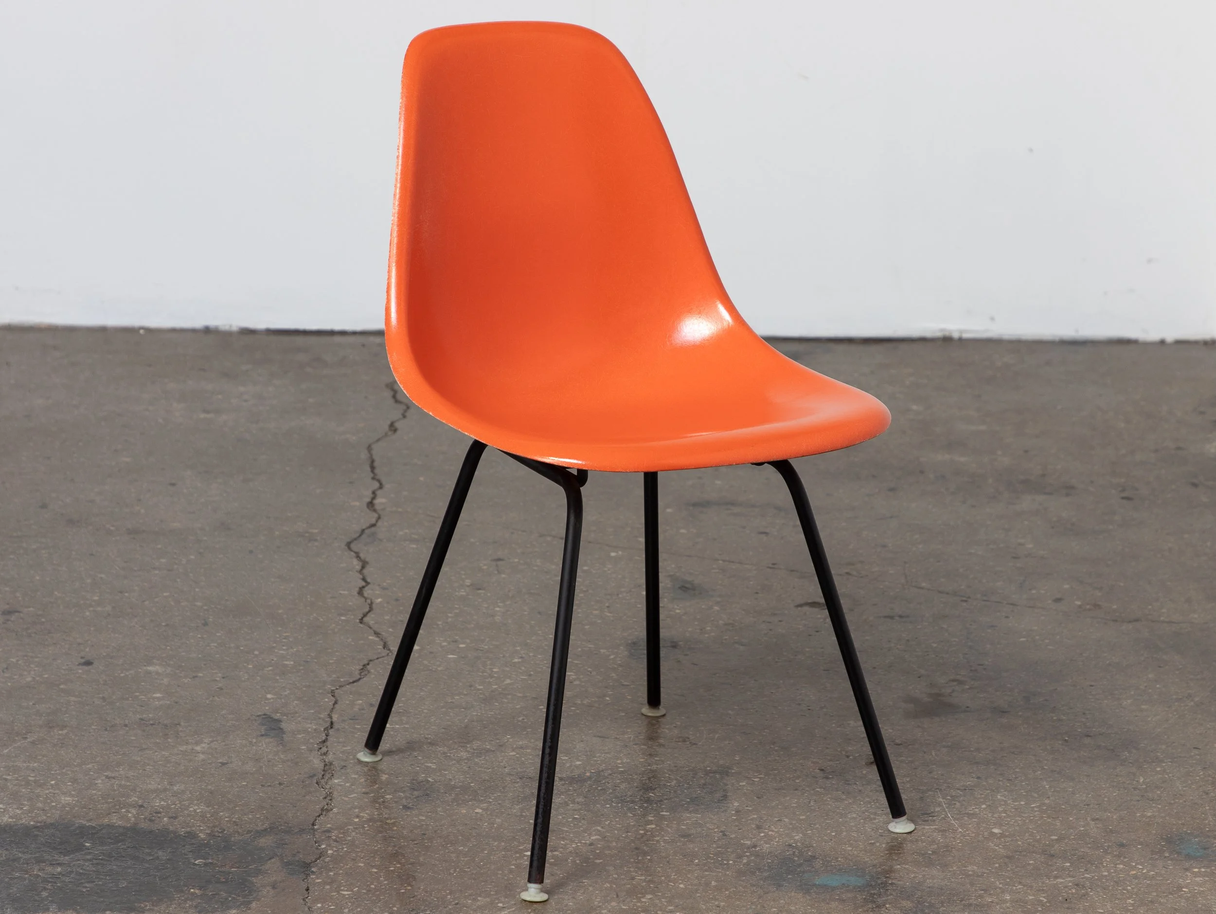 OAM_Orange_Eames_Fiberglass_Shell_on_Black_Base-1.jpg