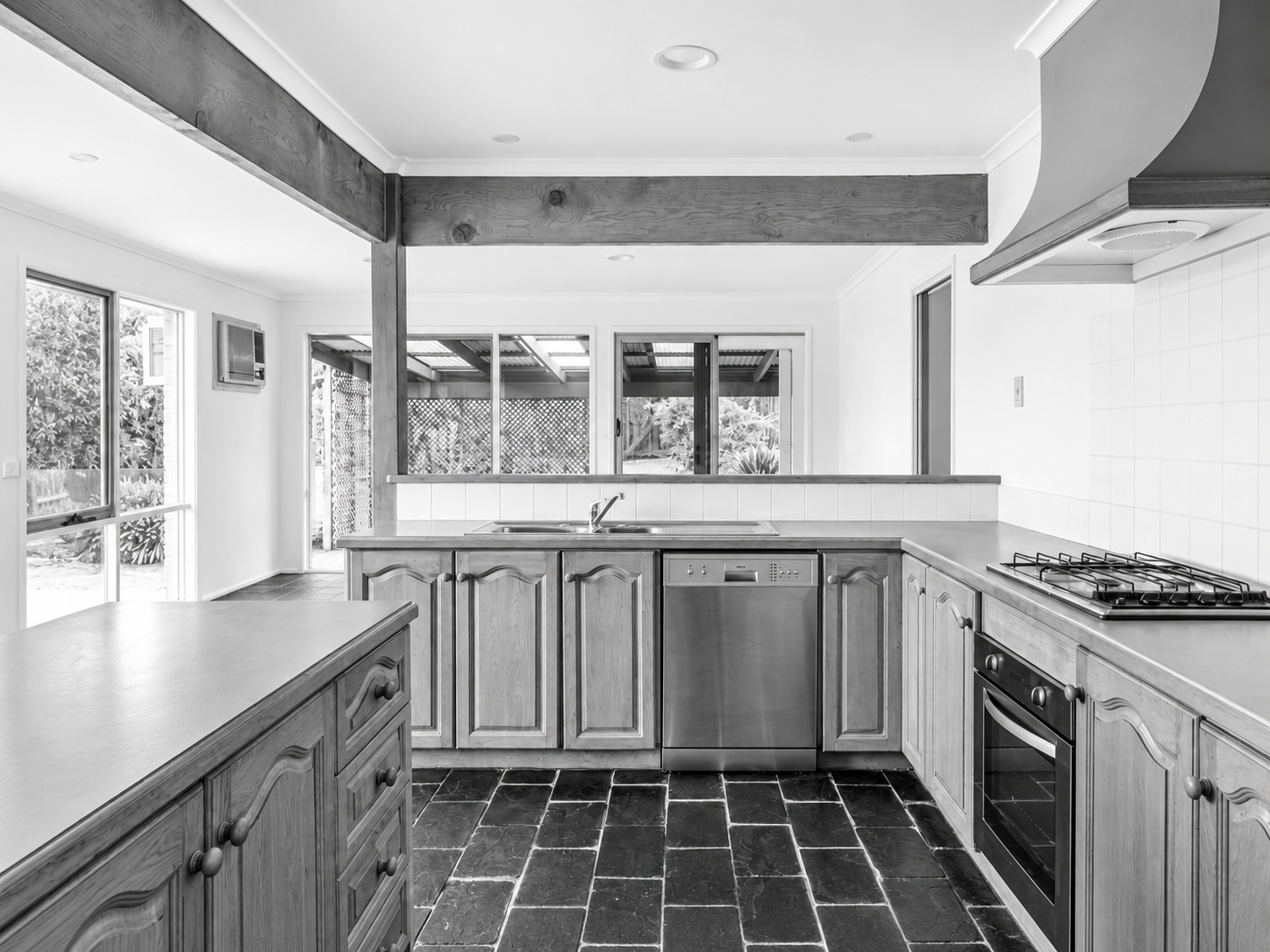 Pool House kitchen before the renovation, by FTLO Design