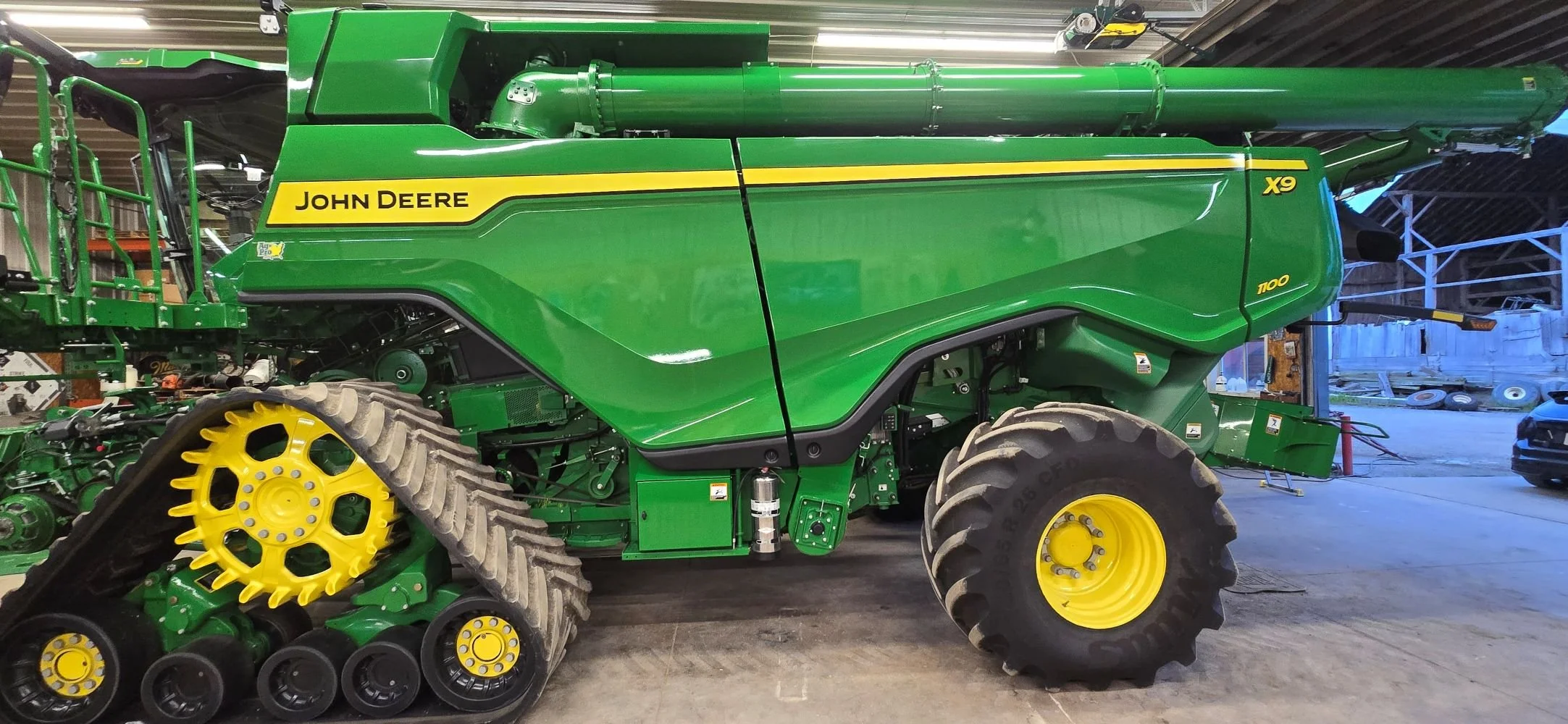 John Deere combine harvester with a glossy ceramic coating.