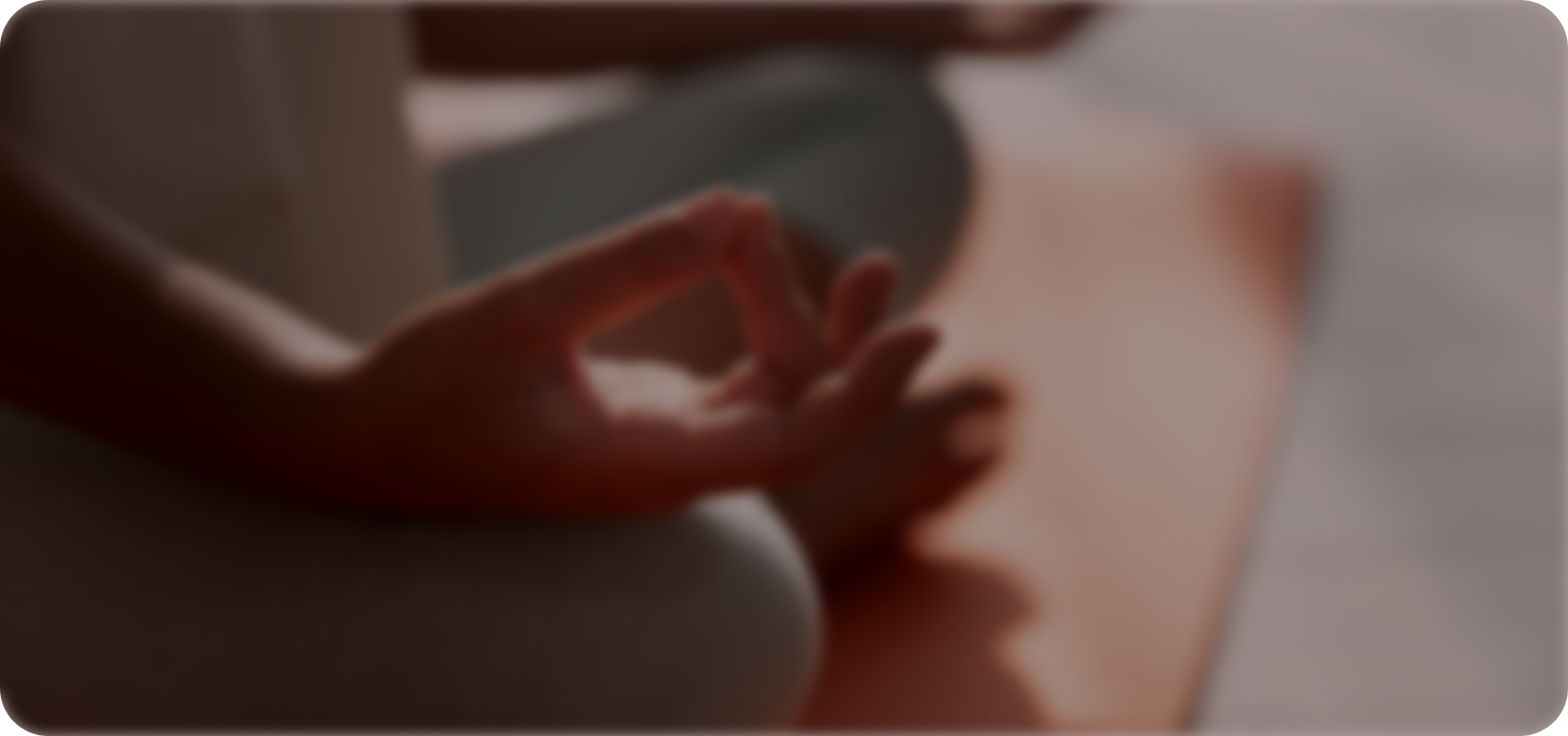 A person holding a smartphone with their fingers, in a relaxed setting.